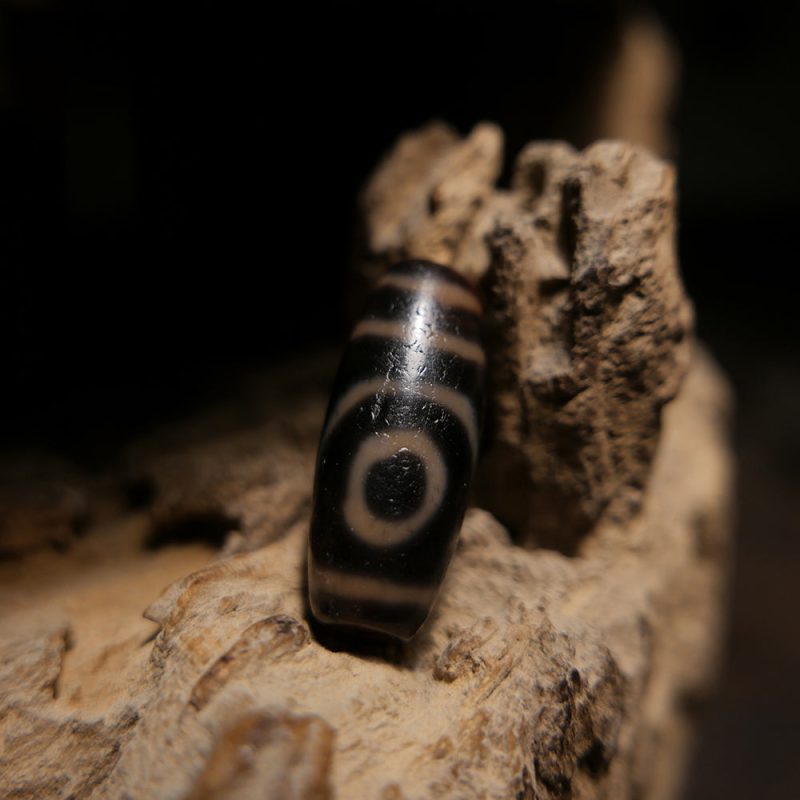 Fortune Guardian Black Two-Eyed Dzi Pendant - Image 3
