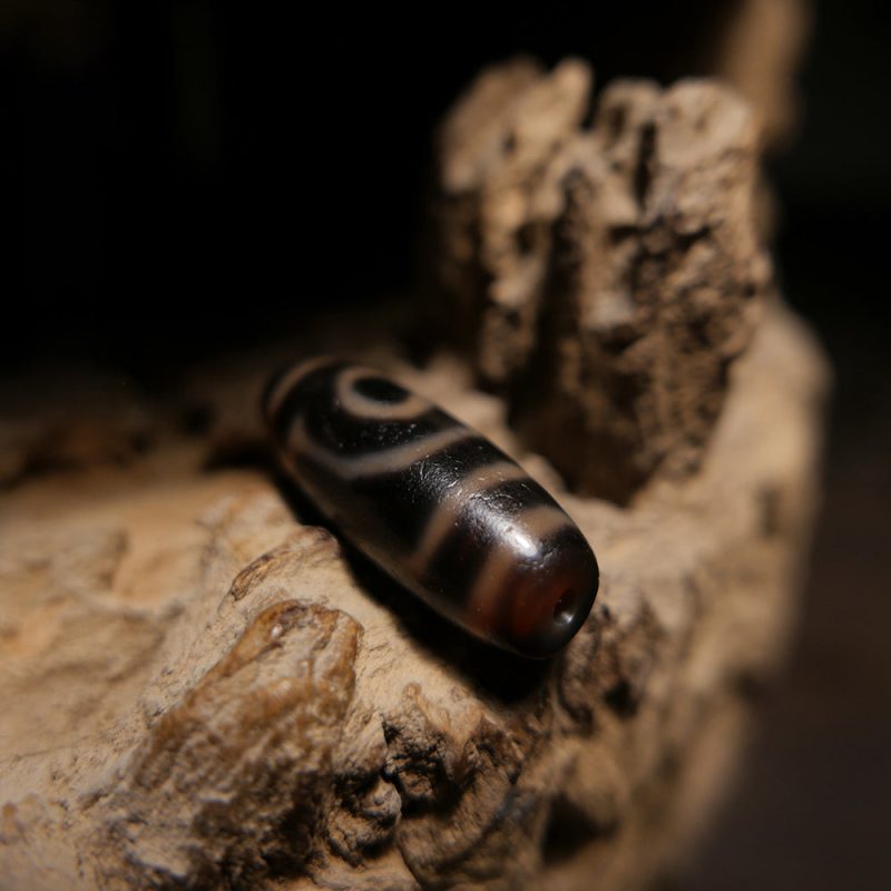 Fortune Guardian Black Two-Eyed Dzi Pendant - Image 4