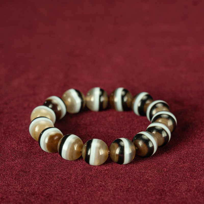 Extremely Rare Three-Color YBhaisajyaguuru Dzi Bead Bracelet with Top Quality - Image 3