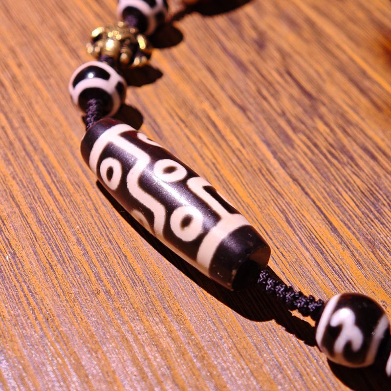 Nine-Eye Tibetan Agate Pendant – Spiritual Protection Necklace with Handcrafted Design - Image 5
