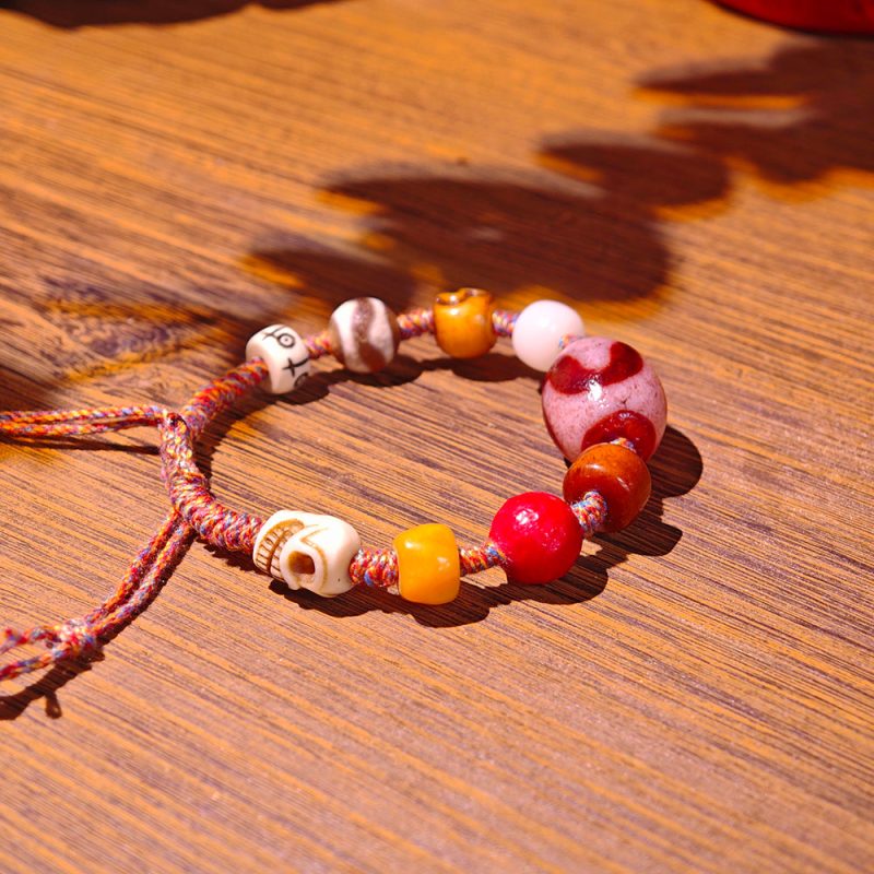 Empowerment Tiger Tooth Agate Bracelet – Handmade with Spiritual Beads - Image 2