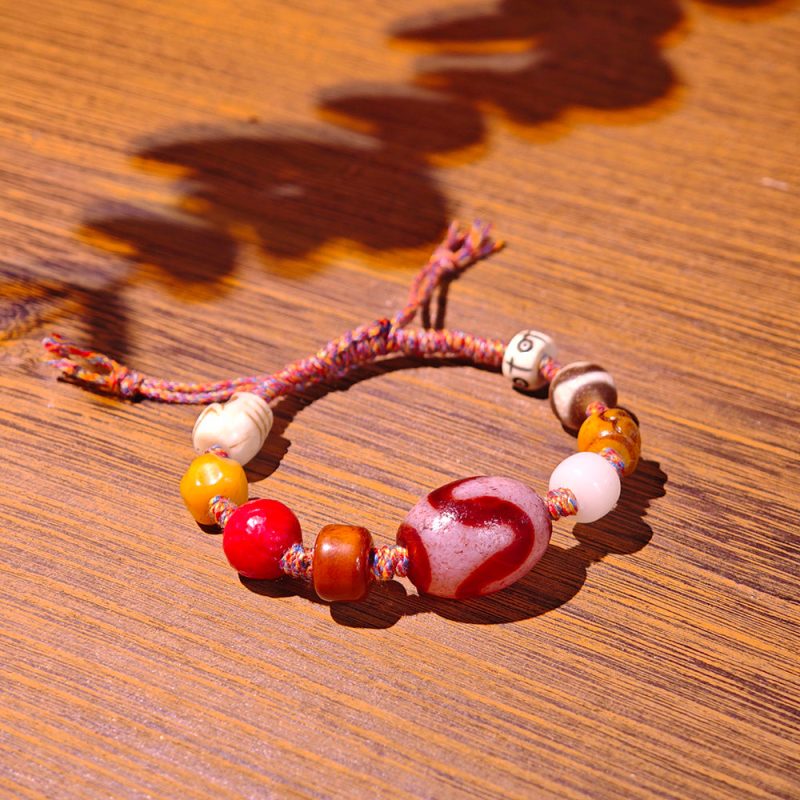 Empowerment Tiger Tooth Agate Bracelet – Handmade with Spiritual Beads - Image 4